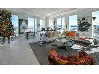 Bright and spacious living room with floor-to-ceiling windows and city views at 3750 Las Vegas Blvd # 4303, Las Vegas, NV 89158