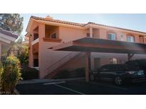 Two-story building with covered parking and stairs at 1050 E Cactus Ave # 2106, Las Vegas, NV 89183