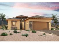 One-story home with a two-car garage and desert landscaping at 124 Cabo Cruces Dr, Henderson, NV 89011