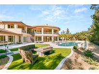 Luxury home with a large pool and patio area at 31 Eagles Landing Ln, Las Vegas, NV 89141