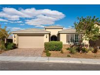 Beautiful home exterior with two car garage at 1438 Dire Wolf Ave, North Las Vegas, NV 89084