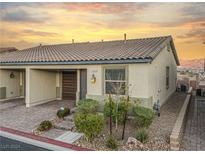 Modern house exterior with desert landscaping at 2664 Chinaberry Hill St, Laughlin, NV 89029