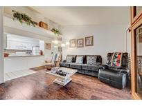 Cozy living room with hardwood floors and a fireplace at 2725 S Nellis Blvd # 2108, Las Vegas, NV 89121