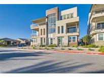 Modern three-story building with multiple units and balconies at 10005 Hematite Pl # 3, Las Vegas, NV 89143
