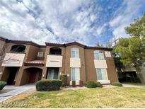 Tan colored building with multiple units and landscaping at 9000 Las Vegas Blvd # 1263, Las Vegas, NV 89123