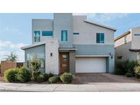 Two-story modern home with attached garage at 3408 Solarino Ln, Henderson, NV 89044