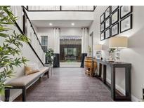 Bright and spacious entryway with tile floors and large window at 4169 San Capri Way, Las Vegas, NV 89141