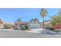 Single-story home with attached garage and landscaping at 3630 Camino Del Sol, North Las Vegas, NV 89032