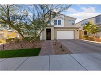 Two-story home with attractive landscaping and driveway at 9675 Bold Skye Ave, Las Vegas, NV 89166