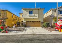 Two-story house with attached garage, landscaping, and holiday decorations at 7745 Donner Peak St, Las Vegas, NV 89166