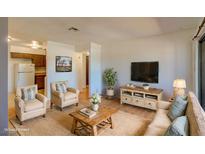 Bright living room featuring a cozy sitting area at 518 Elm St # H, Boulder City, NV 89005