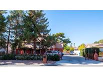 Two-story home with brick exterior and gated entrance at 3265 Rosanna St, Las Vegas, NV 89117