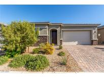 Beautiful curb appeal with well-manicured landscaping at 10254 Baronia St, Las Vegas, NV 89141