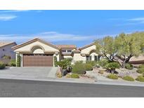 Single story home with desert landscaping at 10032 Hope Island Dr, Las Vegas, NV 89134