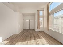 Bright and airy entryway with double doors and wood-look flooring at 5855 Rose Sage St, North Las Vegas, NV 89031