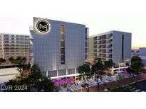 Modern multi-story building with retail space on the ground floor at 924 S First St # 312, Las Vegas, NV 89101