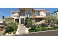 Modern two-story home with a stylish design and landscaping at 4 Olympia Summit Dr, Las Vegas, NV 89141