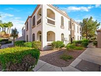 Two-story building with landscaping and walkway at 700 Carnegie St # 1512, Henderson, NV 89052