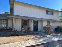 Two-story building exterior with landscaping and a walkway at 1309 Dorothy Ave # 2, Las Vegas, NV 89119