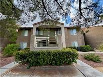 Exterior view of building with landscaping at 2111 Jetty Rock Dr # 207, Las Vegas, NV 89128