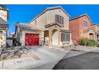 Two-story house with red garage door and desert landscaping at 6796 Pacific Craft Ln, Las Vegas, NV 89122