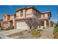 Two-story home with attached garage and desert landscaping at 62 Augusta Course Ave, Las Vegas, NV 89148