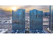 Aerial view of two modern highrise buildings with city views and ample parking at 4575 Dean Martin Dr # 1103, Las Vegas, NV 89103