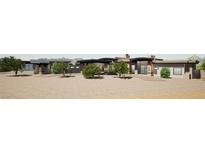 Stunning contemporary home with desert landscaping and expansive driveway at 17 Sky Arc Ct, Henderson, NV 89012