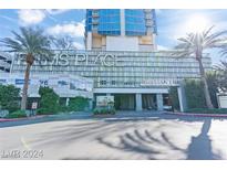 Modern highrise building exterior with Palms Place signage and entryway at 4381 W Flamingo Rd # 1207, Las Vegas, NV 89103