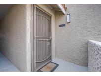 Well-maintained condo entry with security door and address number at 4200 S Valley View Blvd # 3030, Las Vegas, NV 89103