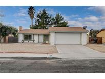 Single-story house with a two-car garage and a landscaped front yard at 4605 Shoen Ave, Las Vegas, NV 89110