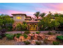 Stunning luxury home with stone accents and a water feature at 5 Wood Creek Ct, Las Vegas, NV 89141