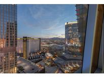 Stunning aerial view of Las Vegas skyline at dusk, showcasing city lights and prominent hotels at 3722 Las Vegas Boulevard S Blvd # 2609, Las Vegas, NV 89158