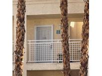 Building exterior with palm trees and parking at , Las Vegas, NV 89118