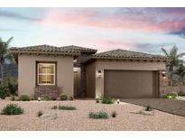 One-story home with a two-car garage and desert landscaping at 114 Amalfi Coast Way, Henderson, NV 89011