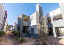 Exterior view of a two-story condo building at 8600 W Charleston Blvd # 1125, Las Vegas, NV 89117