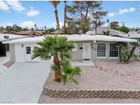 Ranch style home with landscaped front yard and a two-car garage at 3616 Chevy Chase Ave, Las Vegas, NV 89110