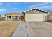 Updated single-story home with a two-car garage and landscaped front yard at 713 Antelope Way, Las Vegas, NV 89145
