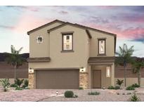 Two-story house with a two-car garage, stone accents, and desert landscaping at 9849 Lost Horse Ave, Las Vegas, NV 89178