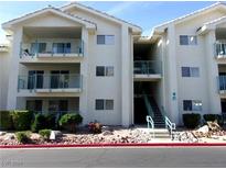 Two-story building exterior with balconies and landscaping at 3550 Bay Sands Dr # 2045, Laughlin, NV 89029