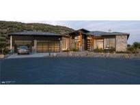 Modern home with stone accents and three-car garage at 323 Wanda Rd, Henderson, NV 89002