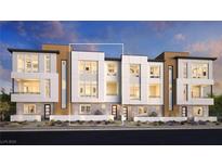 Modern three-story townhome community with clean lines and neutral colors at 651 Agate Bridge St, Las Vegas, NV 89138