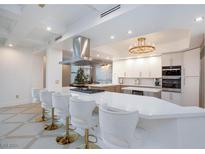 Gourmet kitchen boasts modern appliances and a large island with seating at 2747 Paradise Rd # 1502, Las Vegas, NV 89109