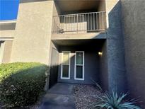 Condo exterior featuring a private entrance and balcony at 454 Sellers Pl, Henderson, NV 89011