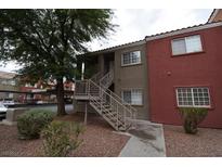 Exterior view of a two-story building with stairs and parking at 4730 E Craig Rd # 2094, Las Vegas, NV 89115