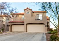 Two-story stucco home with double garage and balcony at 500 Sutters Mill Rd, Henderson, NV 89014