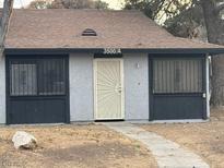 Ranch style home with gray exterior and dark gray trim at 3500 Mercury St # A, North Las Vegas, NV 89030