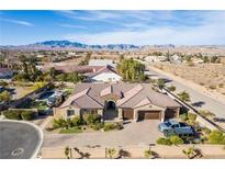 Luxury home with pool and RV parking, offering mountain views at 8801 Crescent Lake St, Las Vegas, NV 89113