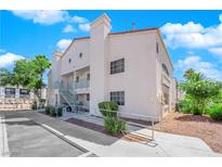 Exterior view of a two-story building with stairs and landscaping at , Las Vegas, NV 89121