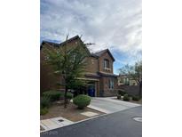 Two-story house with attached garage and landscaped front yard at 3641 Via Terracina, Henderson, NV 89052